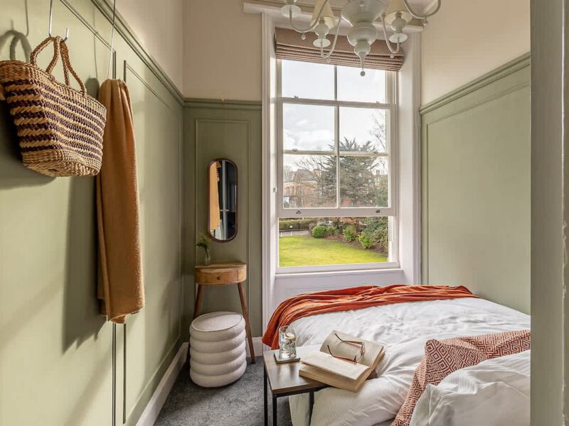 Cozy bedroom with garden view at Crescent View holiday let.