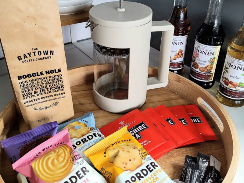 Welcome tray with coffee, tea, biscuits, and Monin syrups at Crescent View.