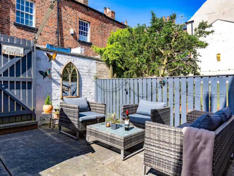 Outdoor seating area at Townhouse Harbour Retreat, perfect for enjoying the harbour views.