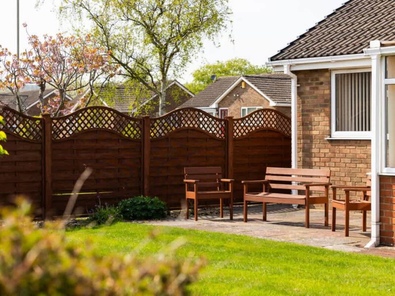 Patio seating area at Coastal Village Hideaway, a holiday let sleeping 4.