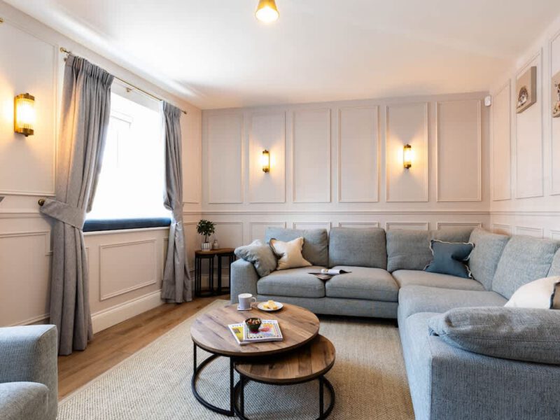 Comfortable living area at Castle View Cottage with hot tub and EV charger.