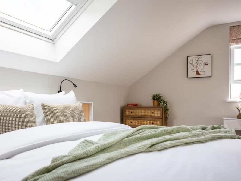 Cozy bedroom with skylight at Ivy Mews barn holiday let.