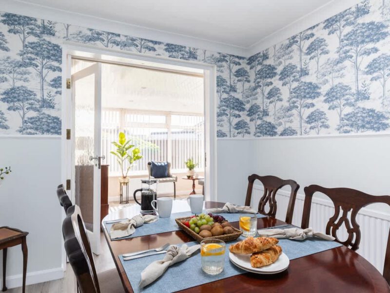 Dining area with breakfast set at Coastal Village Hideaway holiday let.