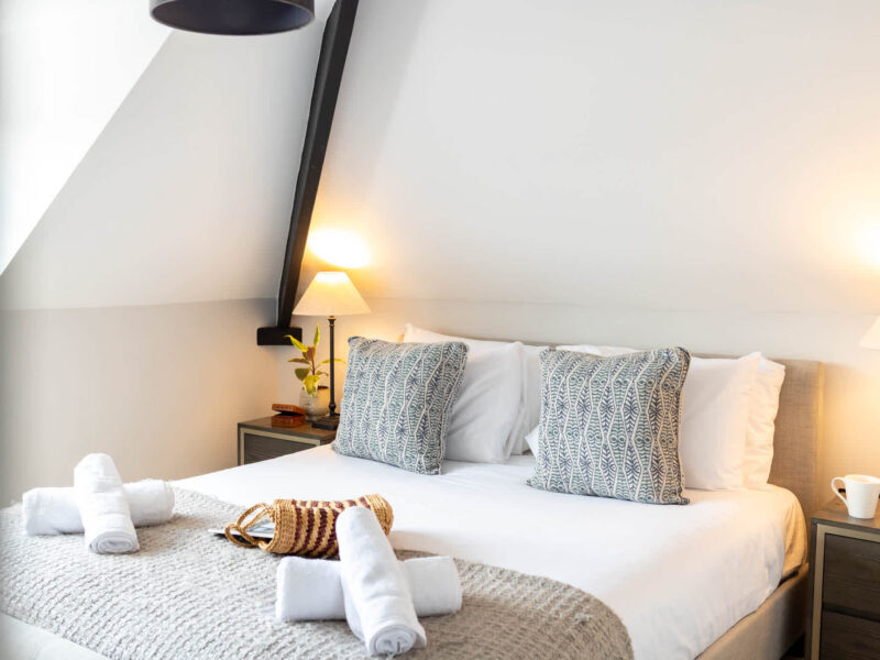 Comfortable bedroom with sea views at Ocean Pearl holiday let.
