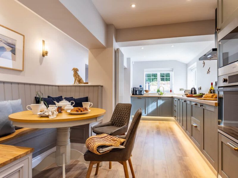 Breakfast nook and modern kitchen at Castle View Cottage, sleeps 6.