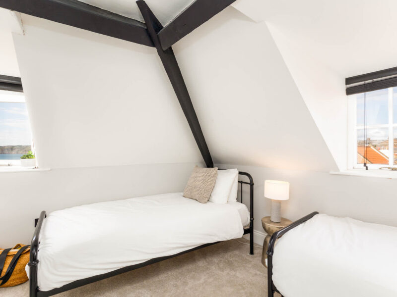 Twin beds with sea views in Ocean Pearl holiday let.