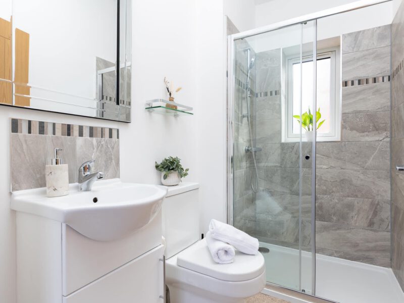 Modern bathroom with shower and vanity at Welton View Escape holiday let.