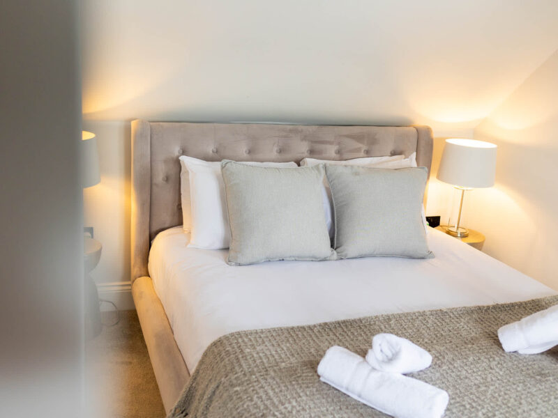 Comfortable bedroom with sea views at Ocean Pearl holiday let.