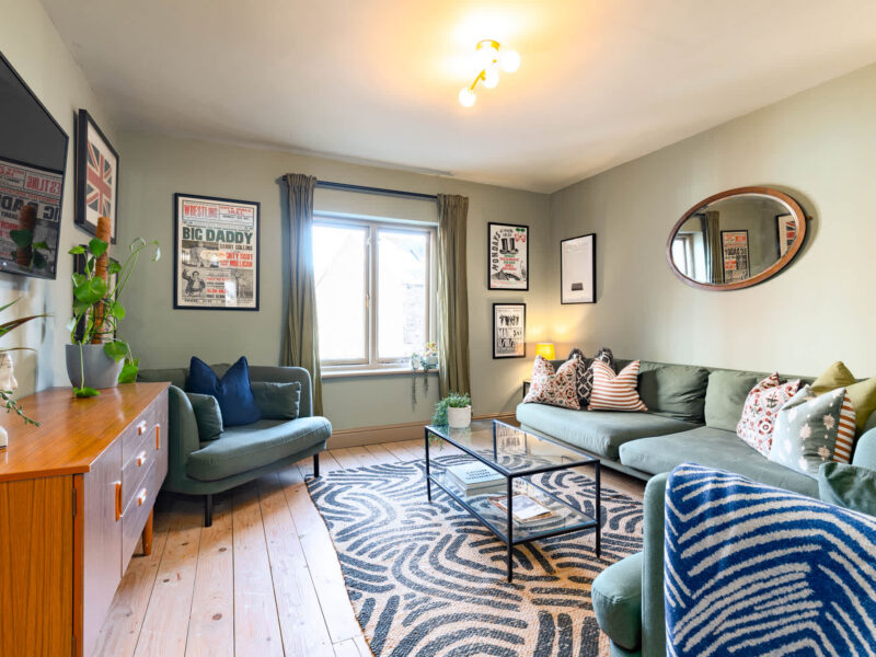 Stylish living room with vintage decor at Old Town House, sleeps 6.