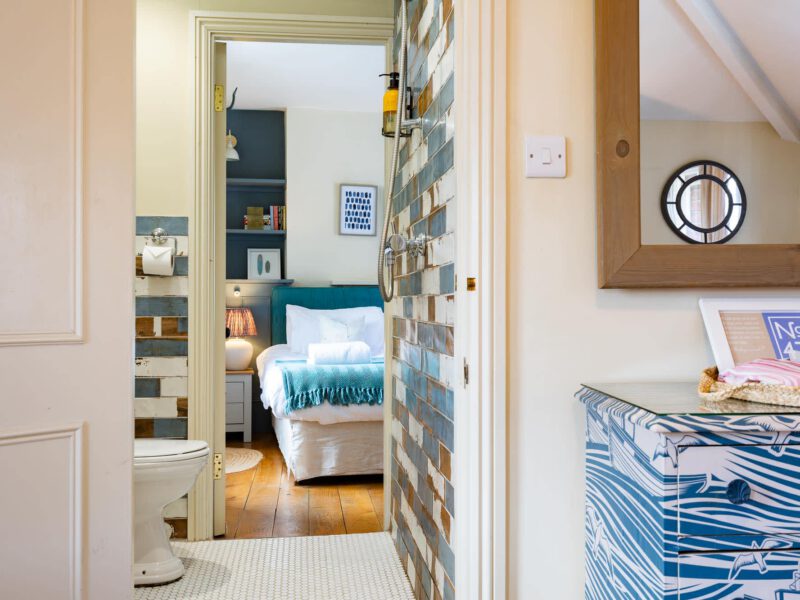 Stylish bathroom and bedroom at Harbour View House, Old Town.
