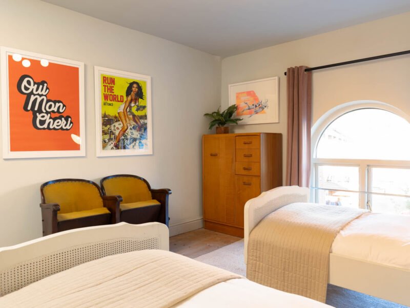 Twin beds in Old Town House, a dog-friendly converted church holiday let.