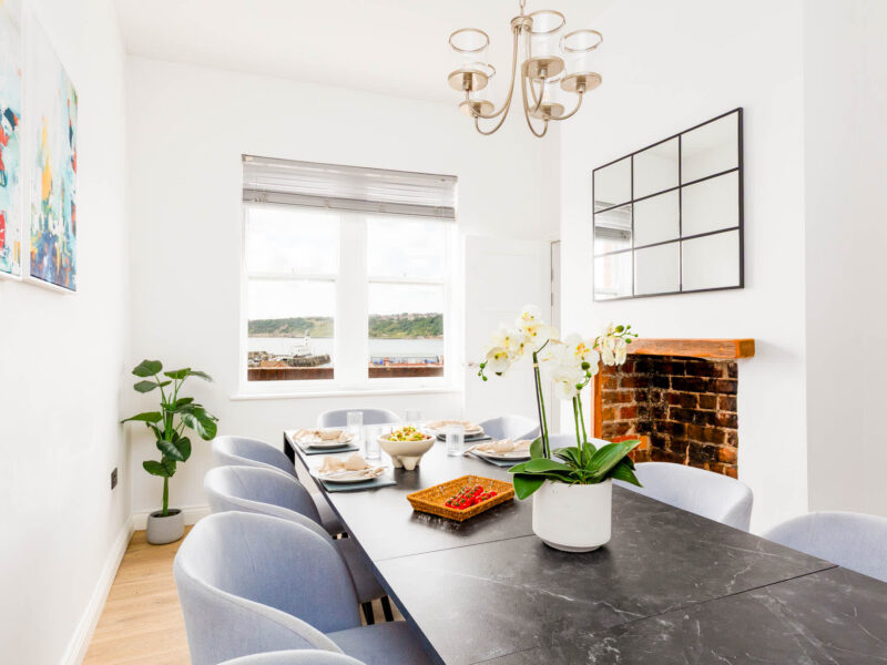 Dining area with sea views at Ocean Pearl holiday let.