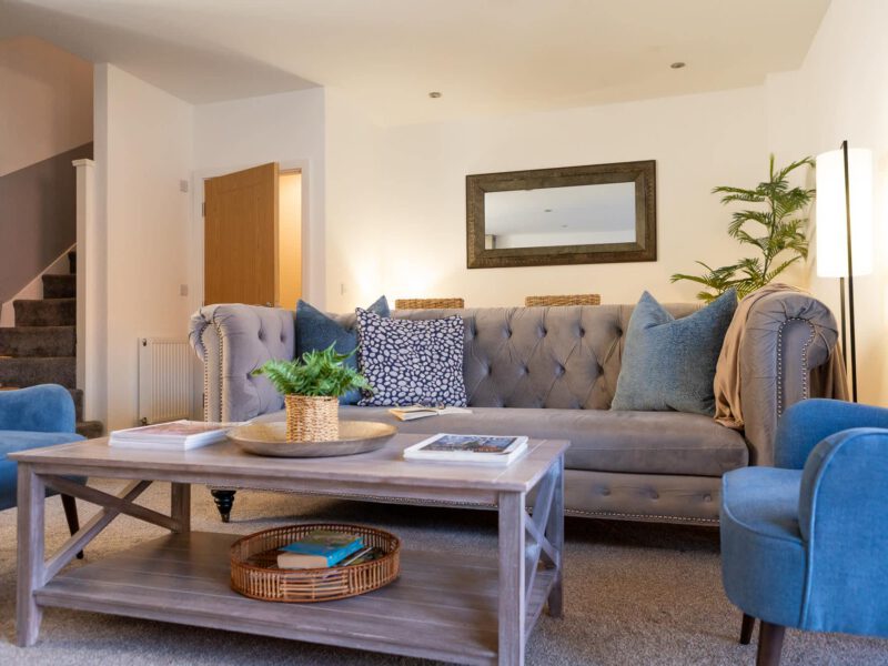 Comfortable living area with sofa and chairs at Welton View Escape holiday let.