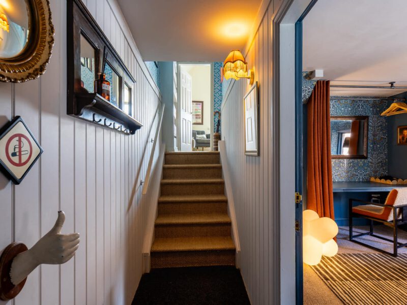 Stylish hallway and stairs at The Loft by the Bay holiday let.