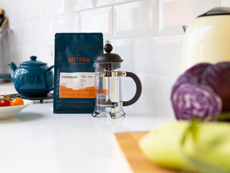 Baytown Coffee Coxswain with French press and fresh ingredients.