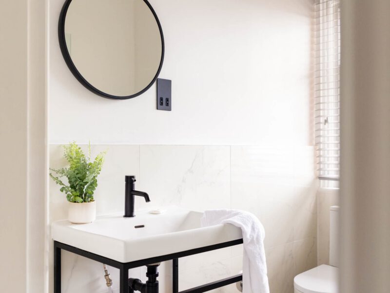 Modern bathroom with sink and toilet at Ocean Pearl holiday let.