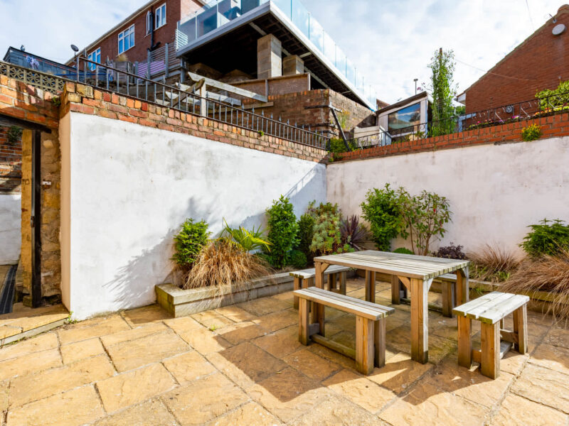 Patio with seating area at Ocean Pearl holiday let.