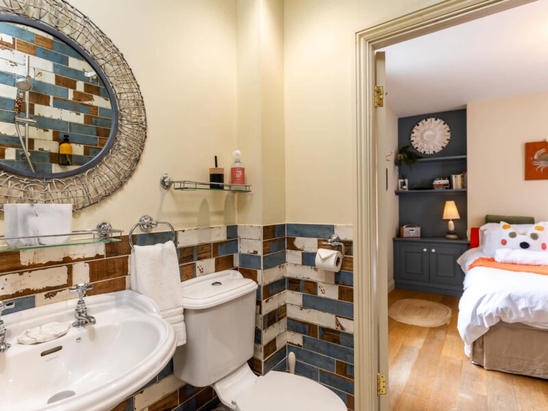 Stylish bathroom and bedroom view at Harbour View House holiday let.