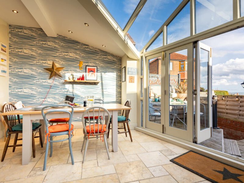 Dining area with sea views at Harbour View House, Old Town.