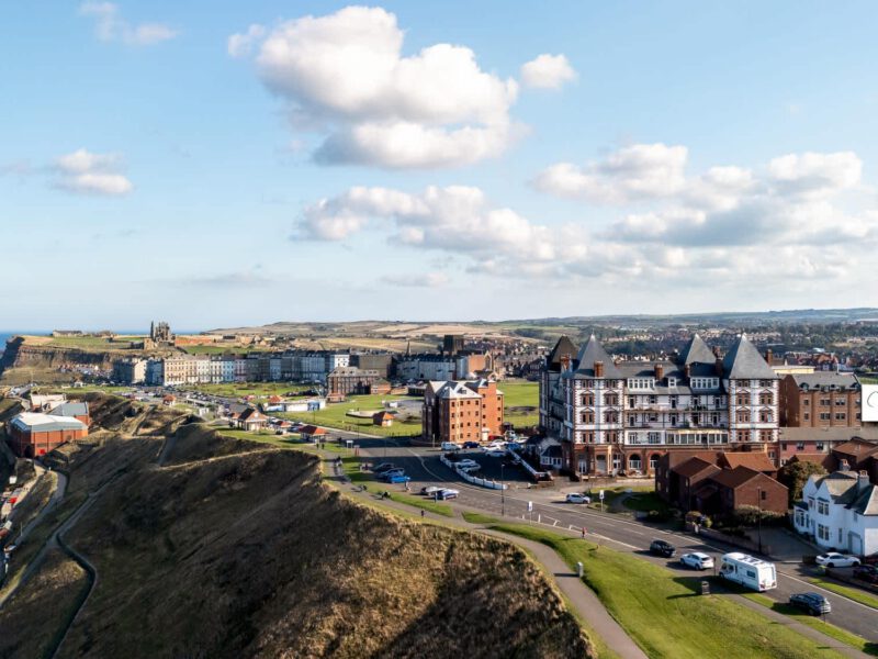 Coastal town view with historic buildings and sea, near Welton View Escape, Whitby