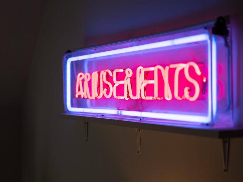 Neon "Amusements" sign at The Loft by the Bay holiday let.