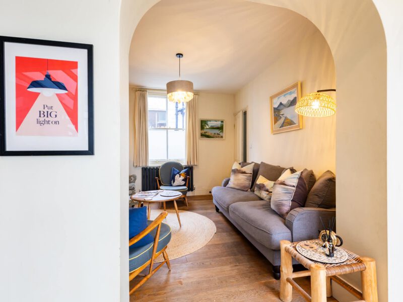 Comfortable living area with sea views at Harbour View House.