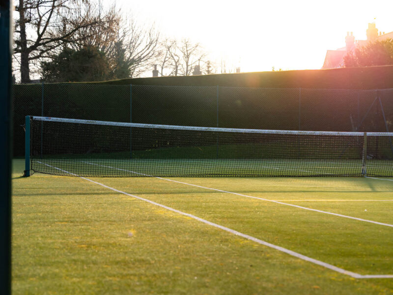 Tennis court at East Wing holiday let, with country and tennis court access.