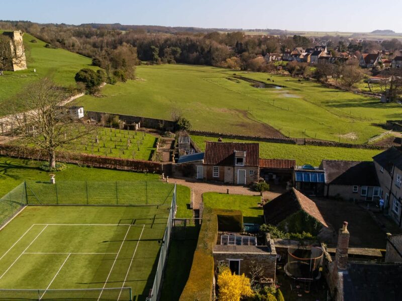 East Wing holiday let with tennis court and countryside views.