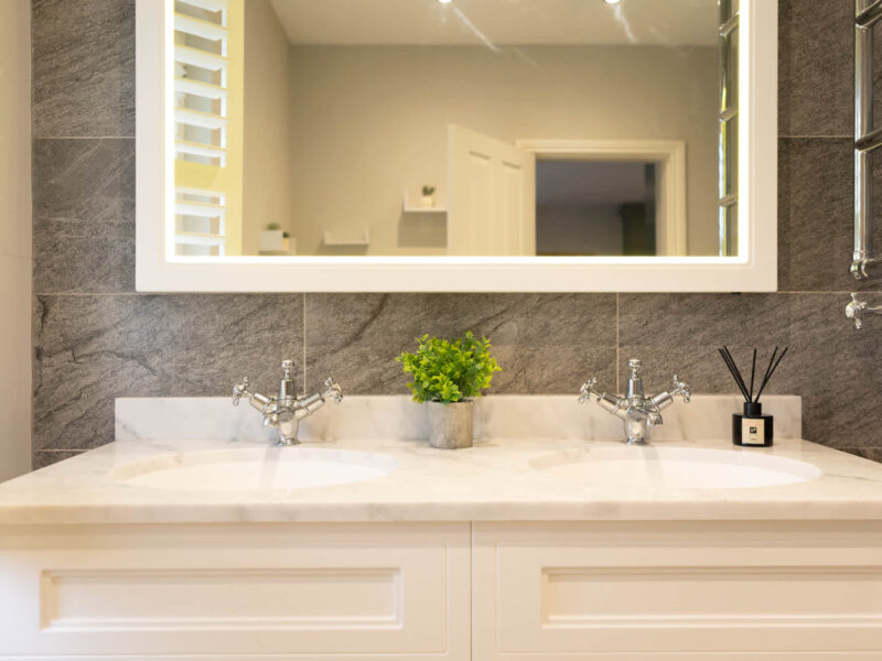 Luxury double vanity bathroom at Malton Retreat, sleeps 10.