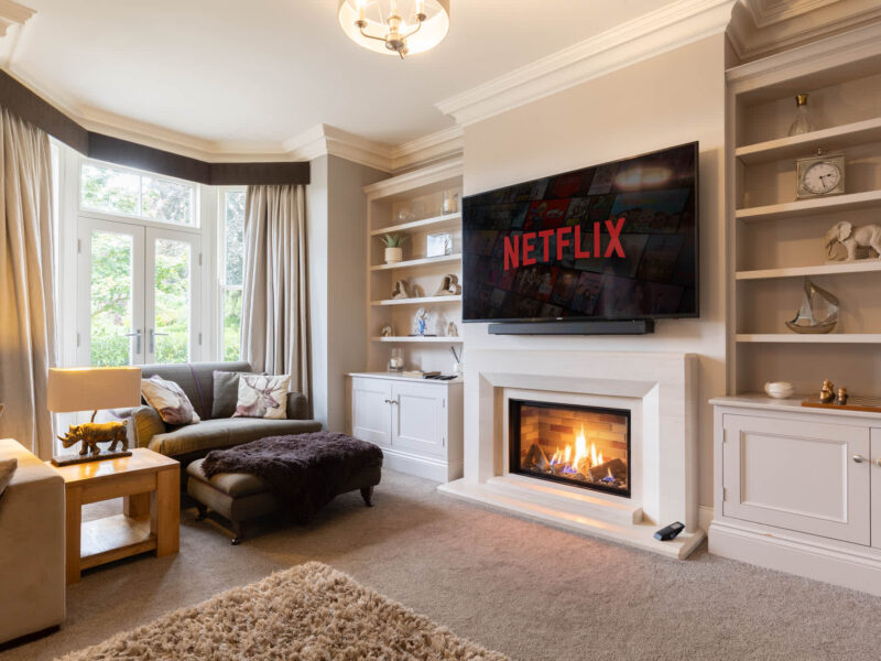 Luxury living room with fireplace and Netflix at Malton Retreat.